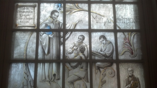 Philip Melancthon, featured on stained glass in the chapel, teaching, preaching, and looking devilishly handsome. A good icon for the event, perhaps?